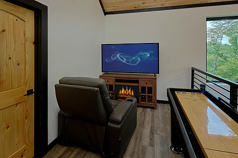 Sitting Area with TV and Games - A Soaky Adventure