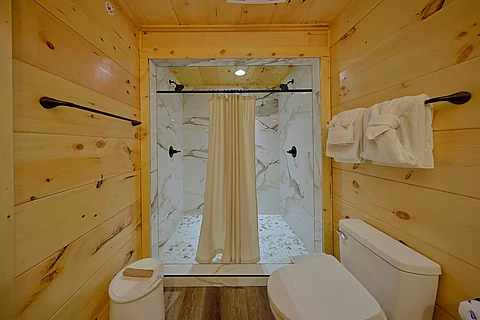 His and Her shower in cabin master Bathroom - An Eagle's View