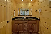 Cabin rental master bathroom with double sinks 