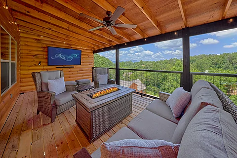 Fire pit and TV outside on 6 bedroom cabin deck - An Eagle's View