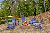 Wood burning fire pit at 6 bedroom cabin rental