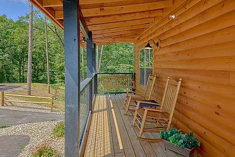 Family cabin with front porch rocking chairs - An Eagle's View