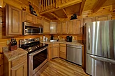 Fully furnished kitchen in rustic cabin
