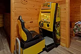 Rustic cabin rental with arcade game room