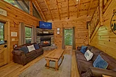 Cozy 4 bedroom cabin living room with fireplace