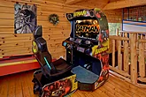 Cabin rental game room with racing game arcades