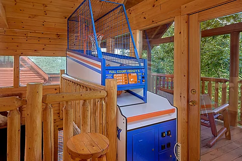 Basketball game in 3 bedroom rental cabin - Fun Zone