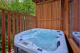 Private hot tub at 3 bedroom cabin rental