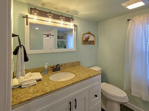 Main Level Bathroom with Shower - Jewell's Place