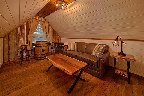 Loft Game Room with Sleeper Sofa and Arcade - Jewell's Place