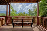 5 bedroom cabin with porch swings and hot tub