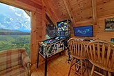 Pool table and arcade game in 4 bedroom cabin