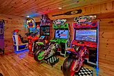 Cabin with motorcycle racing arcade games 