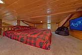 King bed in tiny home cabin rental 