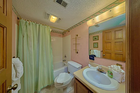 Shared Full Bathroom with Shower/Tub Combo - Our Mountain Home