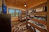 large cabin with 8 sets of full size bunk beds
