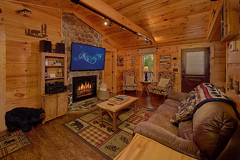 Spacious Living Room with Fireplace and TV - Webb Creek Hideaway