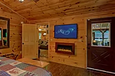 King Bedroom with Electric Fireplace and TV