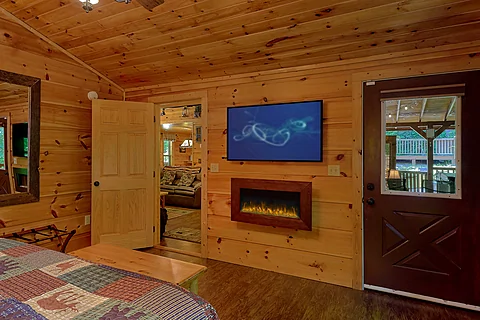 King Bedroom with Electric Fireplace and TV - Webb Creek Hideaway