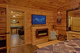 Master Bedroom with Electric Fireplace and TV